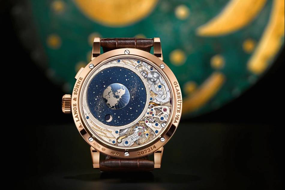 The orbital moon-phase display of this timepiece is calculated with such accuracy that it takes 1,058 years to deviate by one day