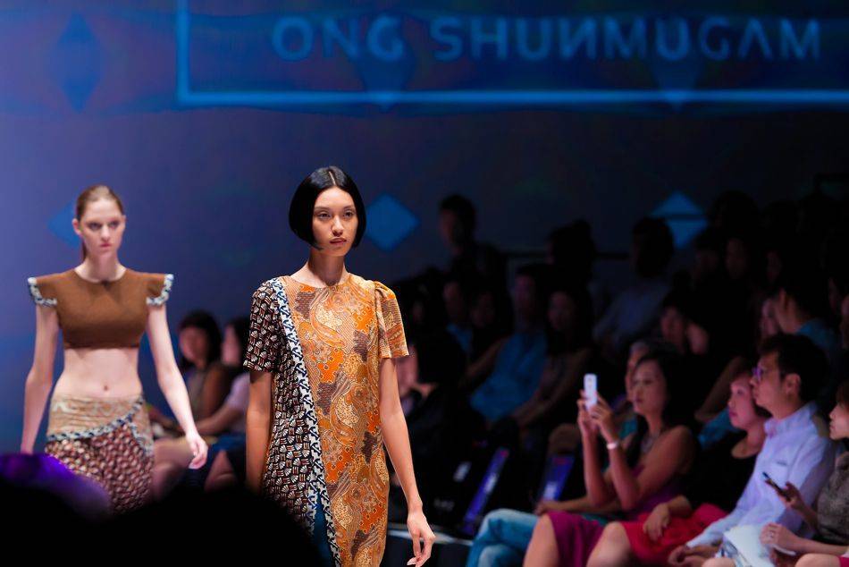 Singapore label ONG SHUNMUGAM showcased its Fall Winter 2014 collection at Audi Fashion Festival, inspired by the architectural heritage of the country