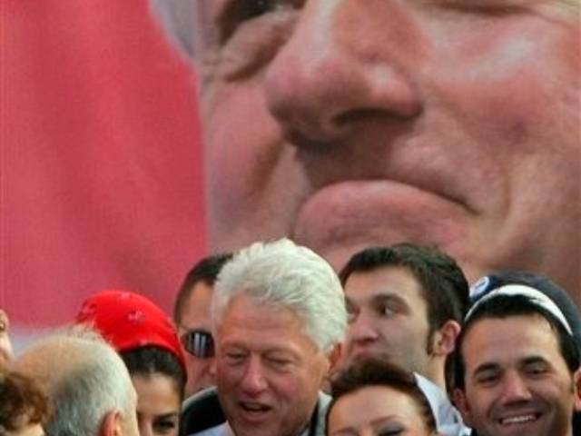 Former US President Bill Clinton attended the unveiling of a statue of himself in the capital of Kos