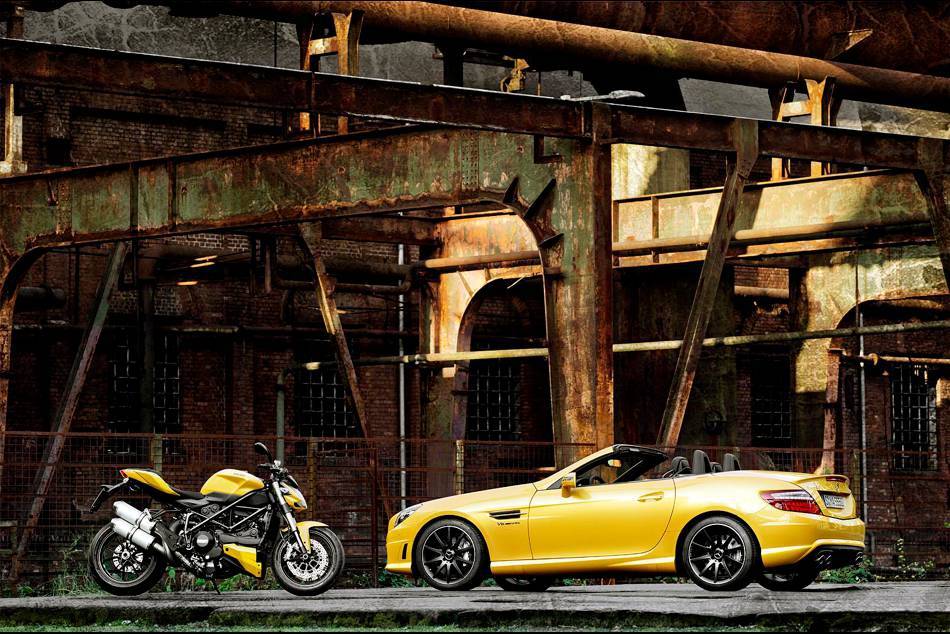 The SLK 55 AMG and Ducati 848 in "Streetfighter Yellow" on display at the Bologna Car Show
