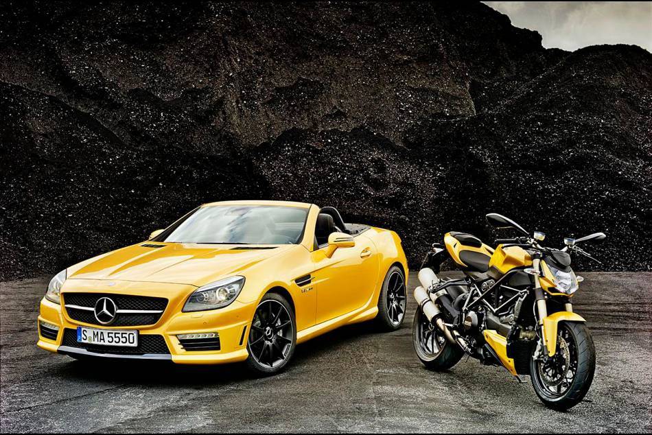 The SLK 55 AMG and Ducati 848 in "Streetfighter Yellow" on display at the Bologna Car Show