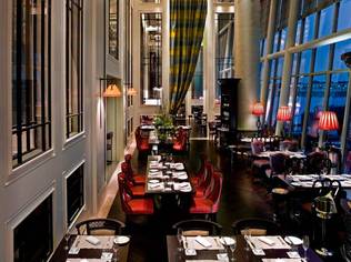 Clifford is a chic brasserie is illuminated by splendid 10-metre high floor-to-ceiling windows