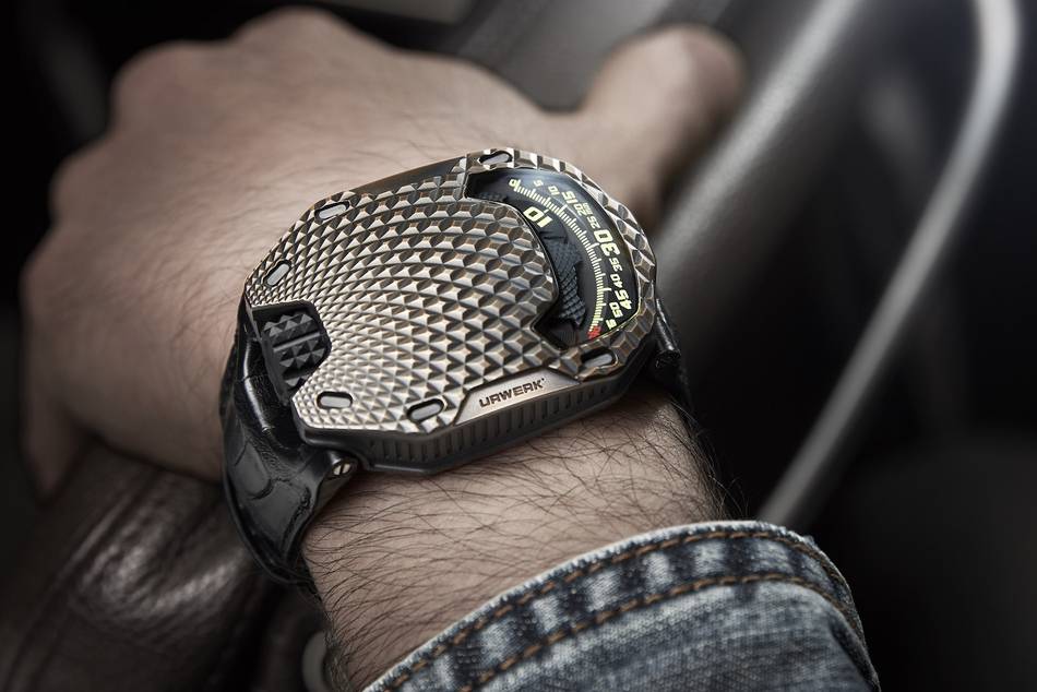 The timepiece's hand patinated bronze case top is inspired by the scaly skin of the prehistoric predator