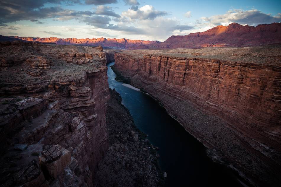 Sunset on the Colorado River at the end of Grand Canyon near Navajo Bridge, Arizona. According to scientists it took the Colorado River about 20 million years to create the Grand Canyon