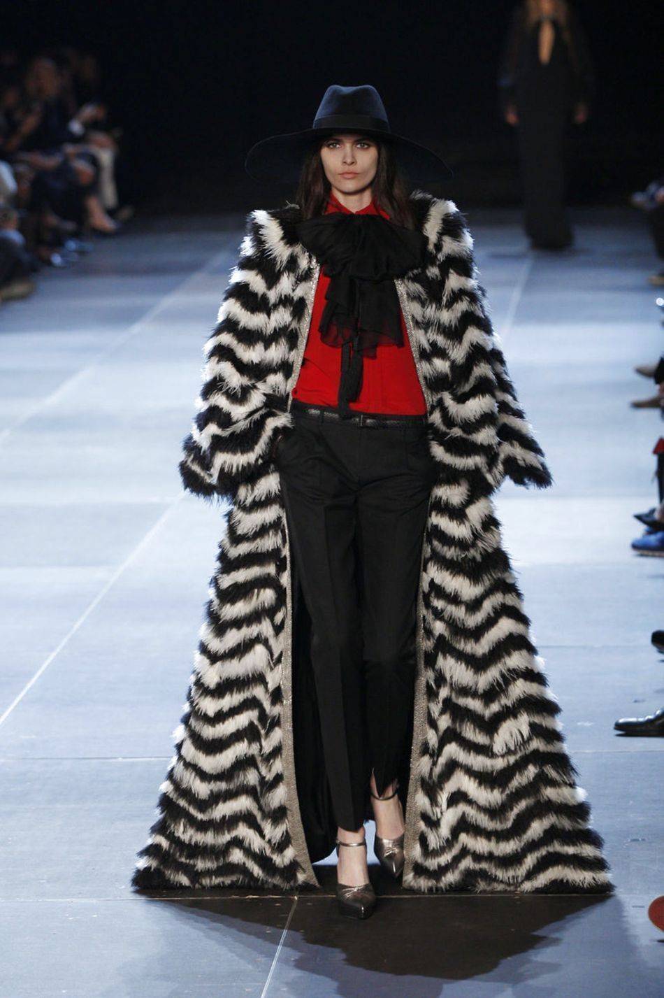 Hedi Slimane looked to the '70s for inspiration for his highly anticipated debut Saint Laurent collection