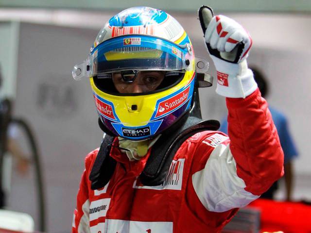 Alonso had a flawless drive to win the Singapore Grand Prix 2010, fending off Vettel who trailed close behind