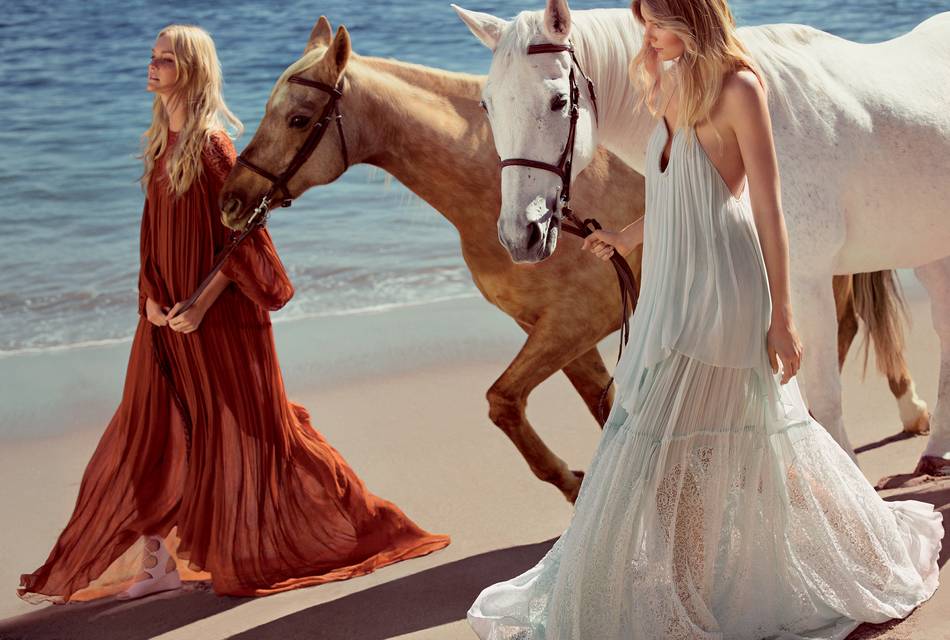 Photographed by Inez & Vinoodh Matadin, models Caroline Trentini and Eniko Mihalik soak in the sun and the surf in California