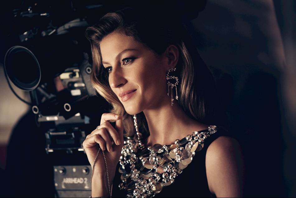 The film was produced, conceived, and directed by filmmaker Baz Luhrmann with production design by Oscar-winner Catherine Martin, and stars supermodel Gisele Bündchen