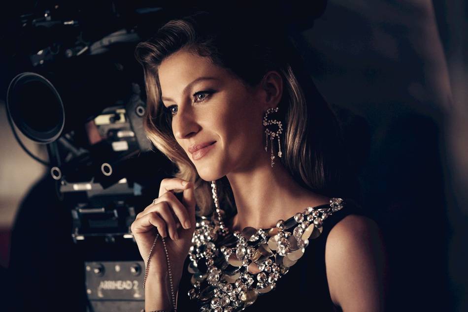 The film was produced, conceived, and directed by filmmaker Baz Luhrmann with production design by Oscar-winner Catherine Martin, and stars supermodel Gisele Bündchen