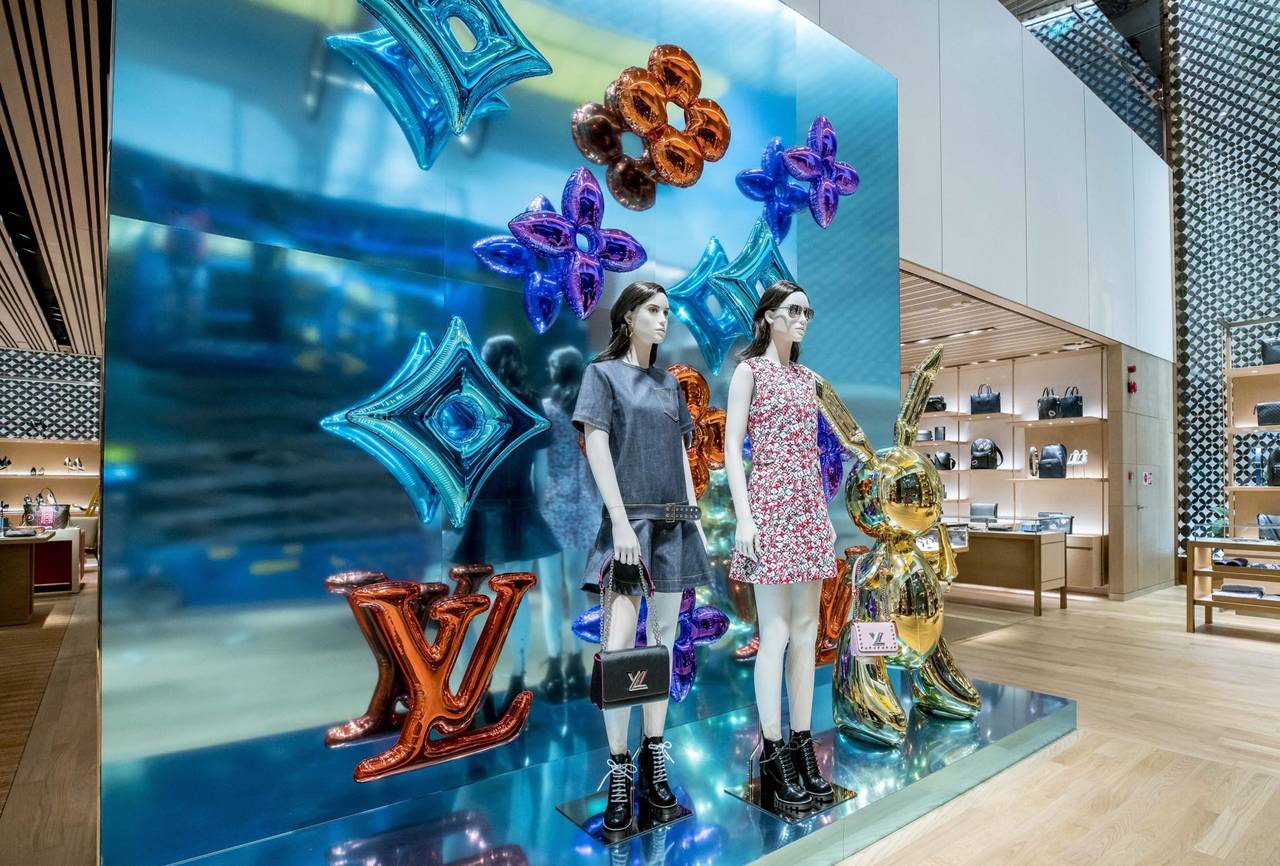 SINGAPORE - CIRCA APRIL, 2019: goods on display at Louis Vuitton store in  Changi International Airport. Stock Photo