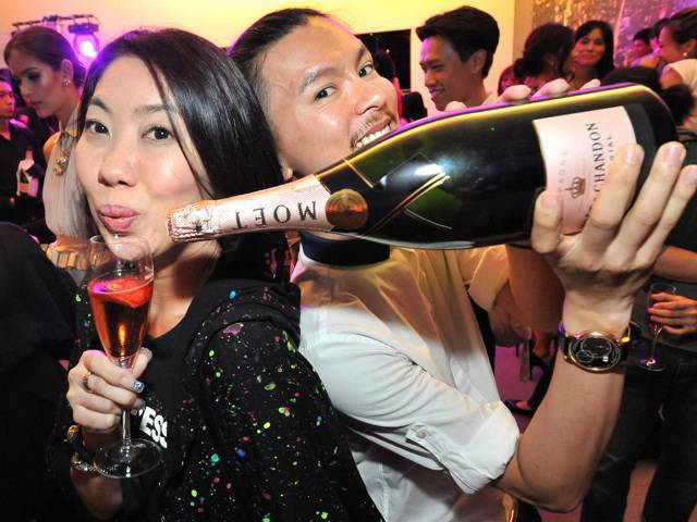Attended by the beautiful and glamorous, partying with their favorite champagne, Moët & Chandon