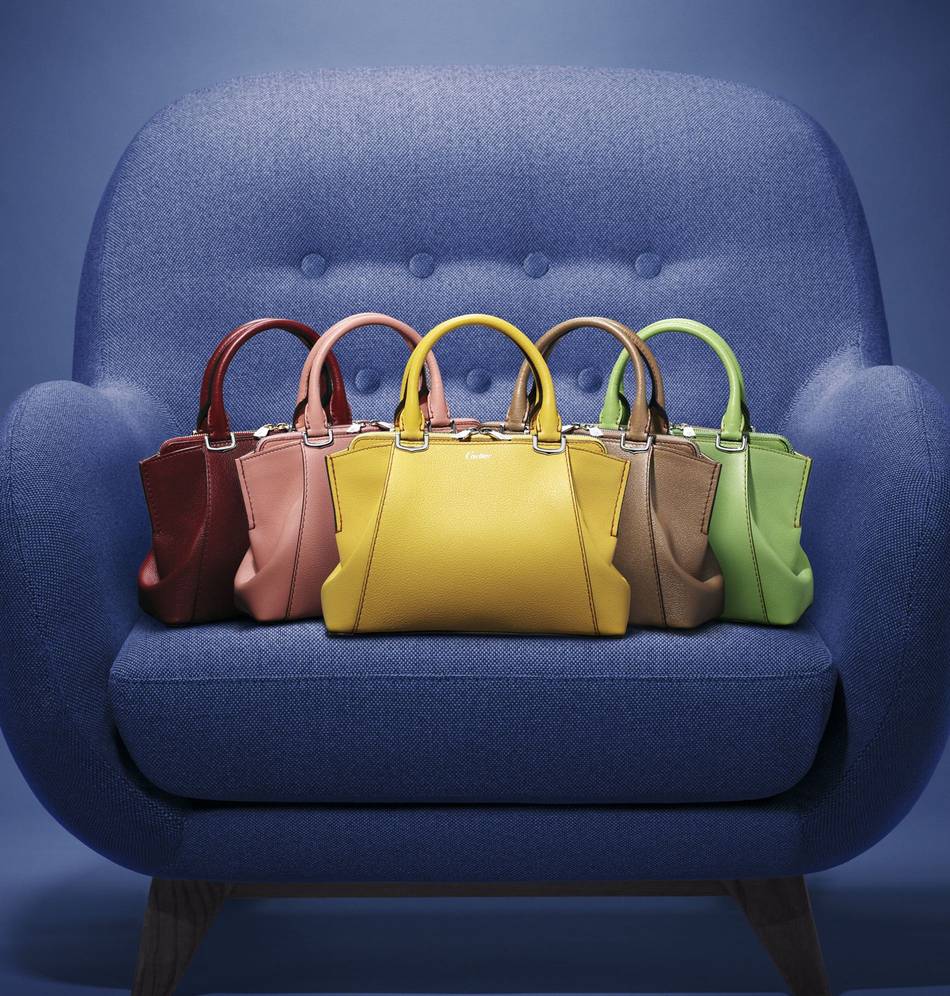 An XS version of the C de Cartier bag this season channels a baby-doll style in sharp, bright tones