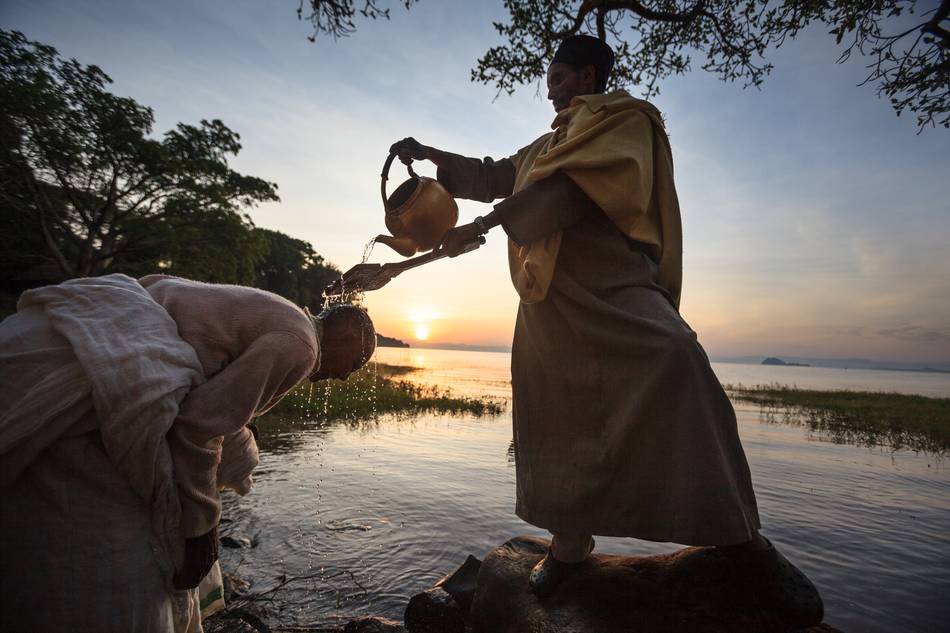 Ethiopia – Each Epiphany morning, Lake Tana’s water is consecrated by a priest and sprinkled into the crowd. Some pilgrims enter into the lake to symbolize their baptism