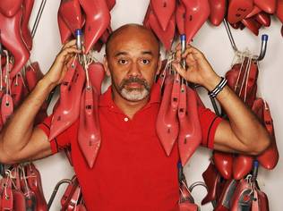 Christian Louboutin topped his 20th career anniversary with his first retrospective exhibition held at the Design Museum in London