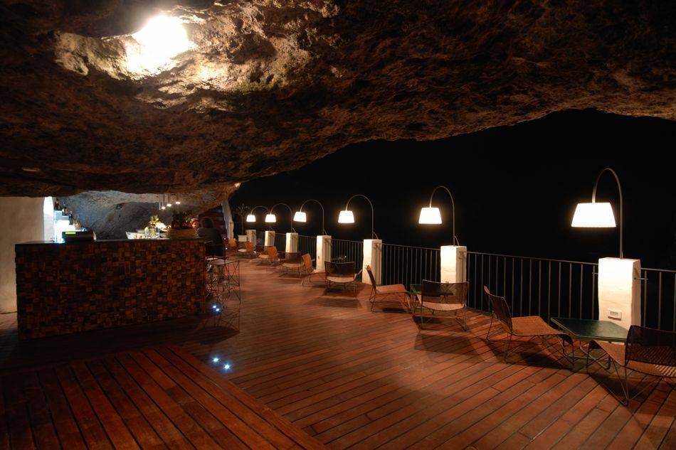 Carved out of magnificent limestone rocks,with a view over the blue-green Adriatic is La Grotta Palazzese