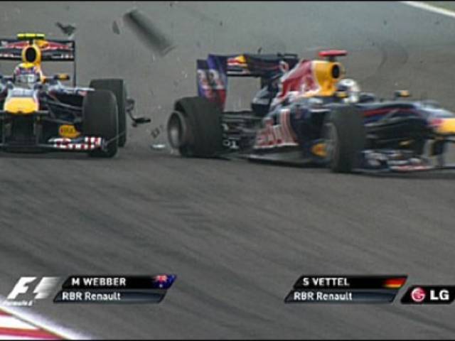 Sebastian Vettel collides with, while trying to overtake, teammate Mark Webber