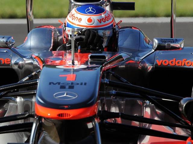 Jenson Button topped the morning timesheets at the Italian circuit