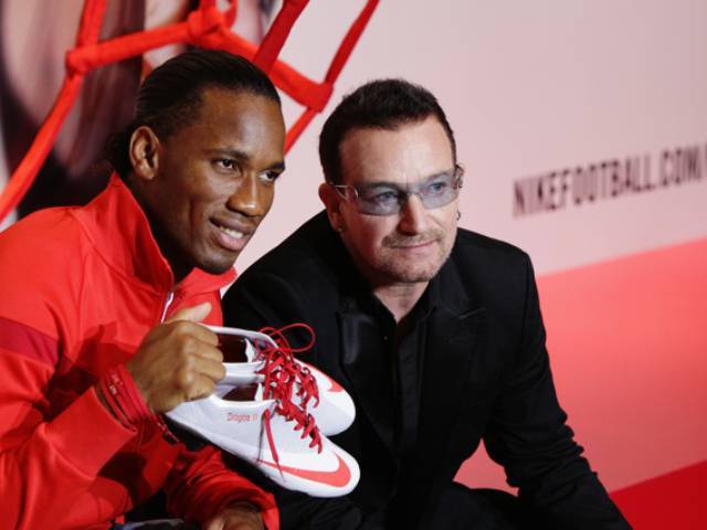 Didier Drogba and Bono at the announcement of partnership between NIKE and (RED)