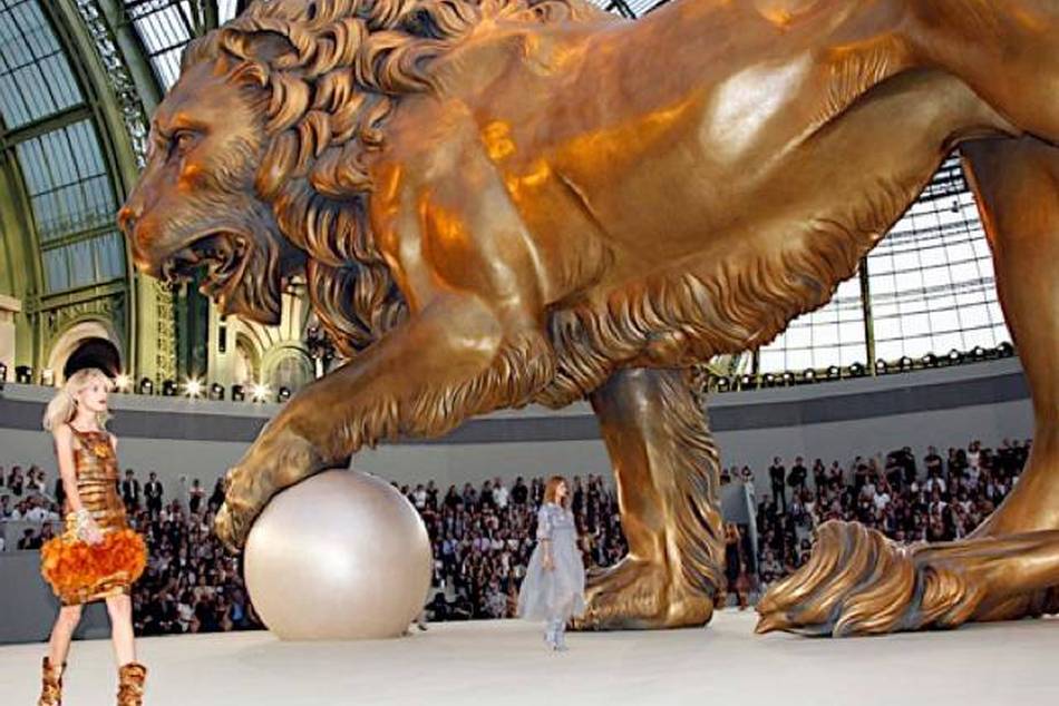 A several story-tall golden lion presided over Chanel's fall/winter 2011 haute couture