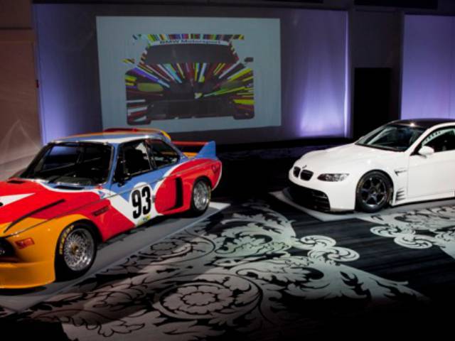 The Alexander Calder BMW Art Car, left, and the next Art Car, a BMW M3 GT2