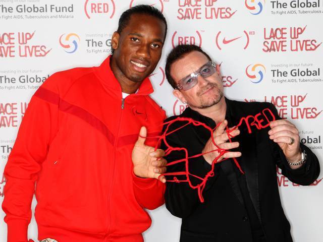 Didier Drogba and Bono at the announcement of partnership between NIKE and (RED)