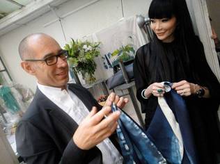 Grand Couturier Gustavo Lins with Dr. Georgia Lee at his atelier in Paris