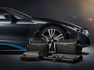 Futuristic travel bags specially made by the French luxury label for the progressive driving German machine made from carbon fibre