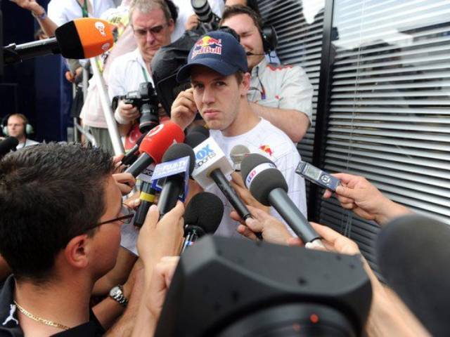 Media frenzy surrounds Vettel after his collision with teammate Webber who was leading