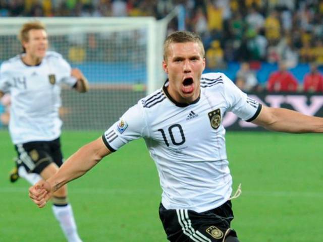 Germany's striker Lukas Podolski celebrates after scoring the opening goal against Australia